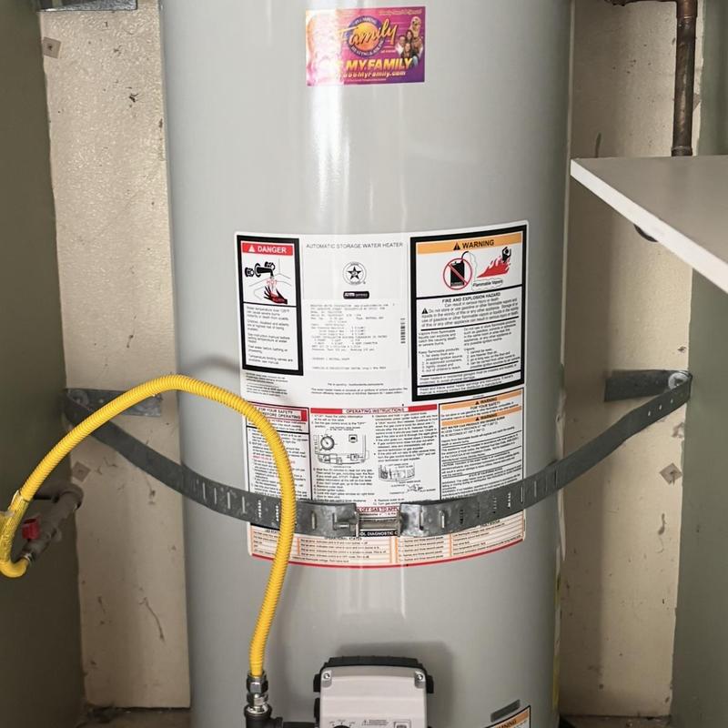 Natural gas water heater with safety upgrades installed