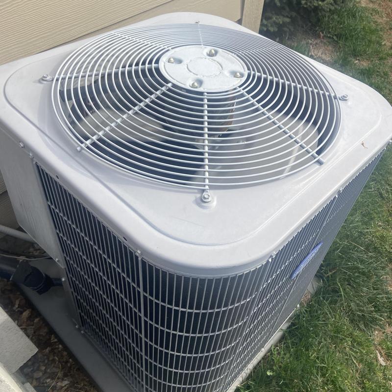 Outdoor AC unit condenser with new contactor installed