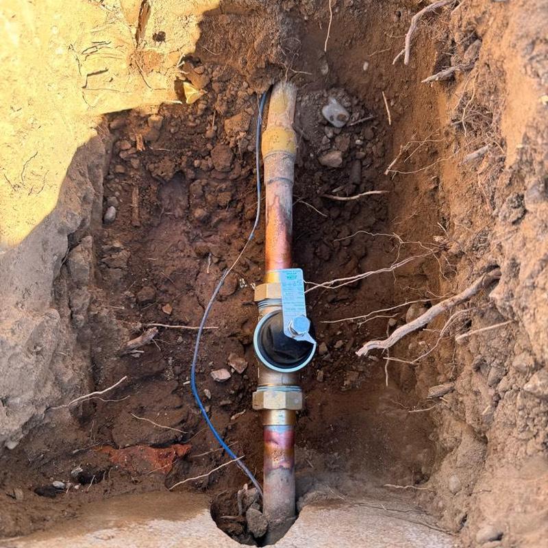 Pressure regulating valve on copper water line underground