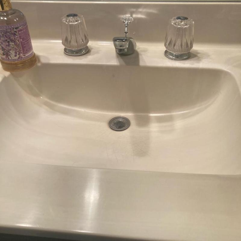 Bathroom sink faucet with clear knobs and soap dispenser
