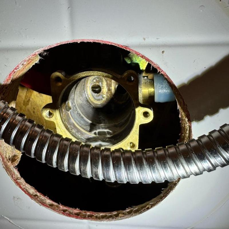 Price Pfister shower cartridge housing inside wall cavity Price Pfister shower cartridge housing inside wall cavity