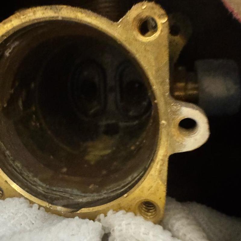 Price Pfister shower cartridge housing close-up view Price Pfister shower cartridge housing close-up view