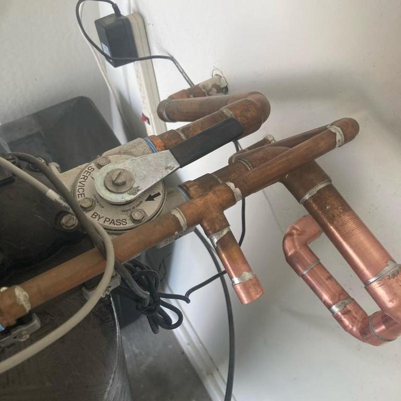 Water softener copper piping with control valve setup