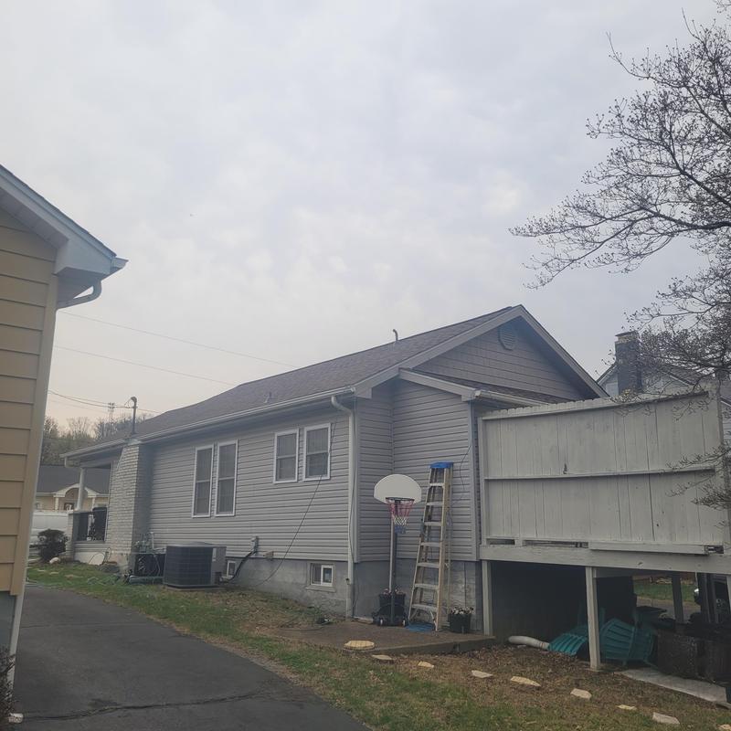 Asphalt shingle roof replacement on residential house