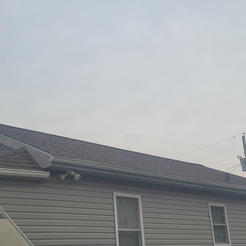 Asphalt shingle roof with new fascia and gutters