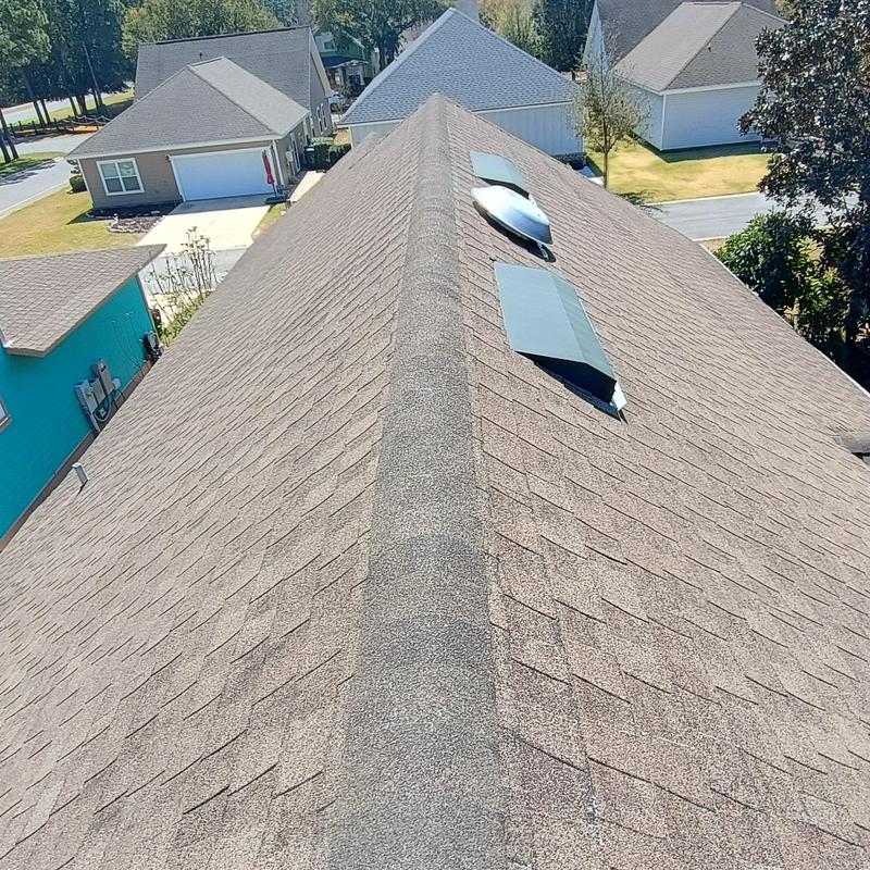 Asphalt shingle roof ridge and vents inspected, no damage Asphalt shingle roof ridge and vents inspected, no damage