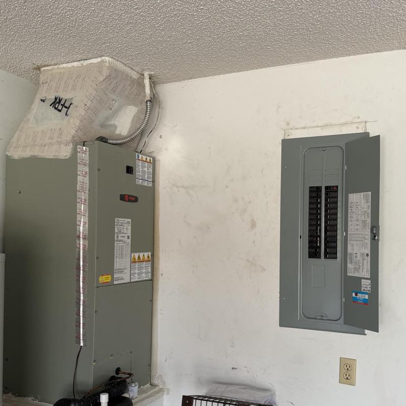 Air handler unit and electrical panel installation in garage