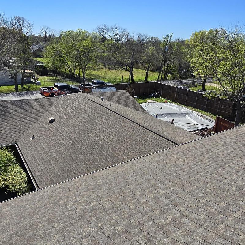 Asphalt shingle roof after hail and wind damage inspection