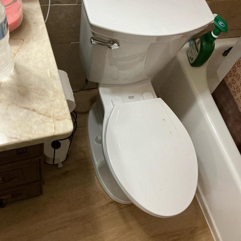 Toilet flange installation with secured commode reset