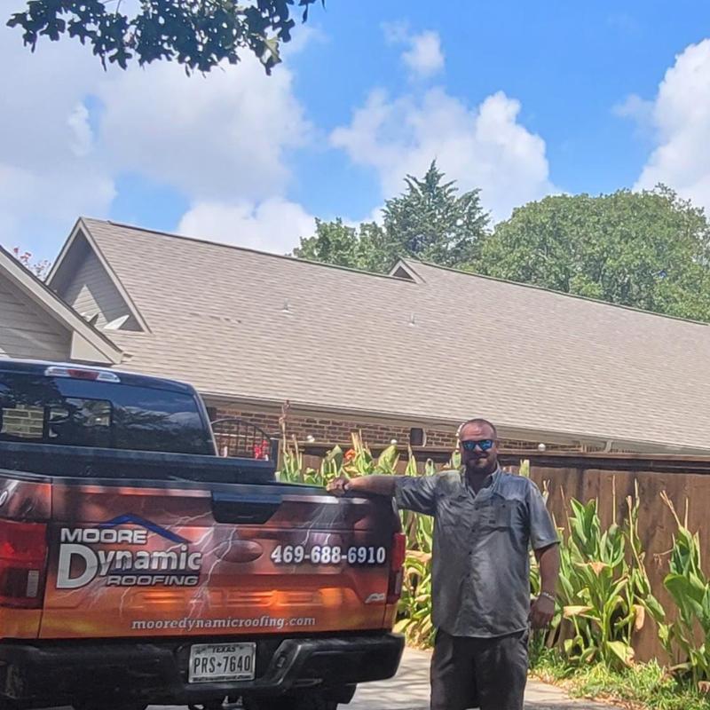 Asphalt shingle roof with hail damage and contractor