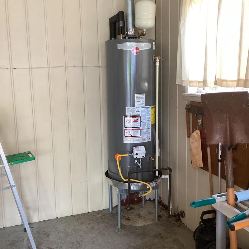 Natural gas water heater with new piping and expansion tank