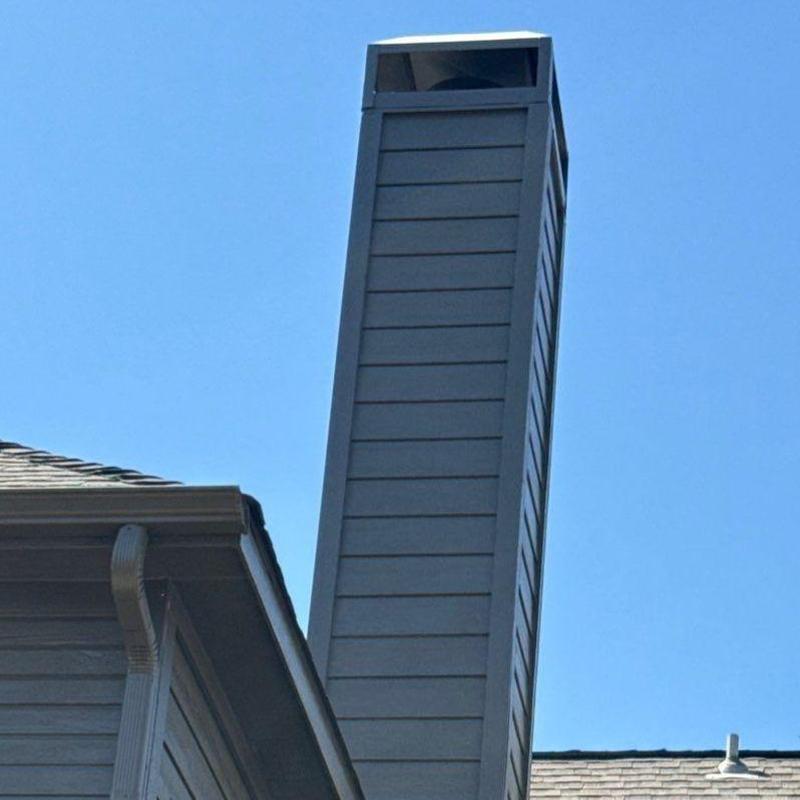 Chimney siding with new LP SmartSide trim installed