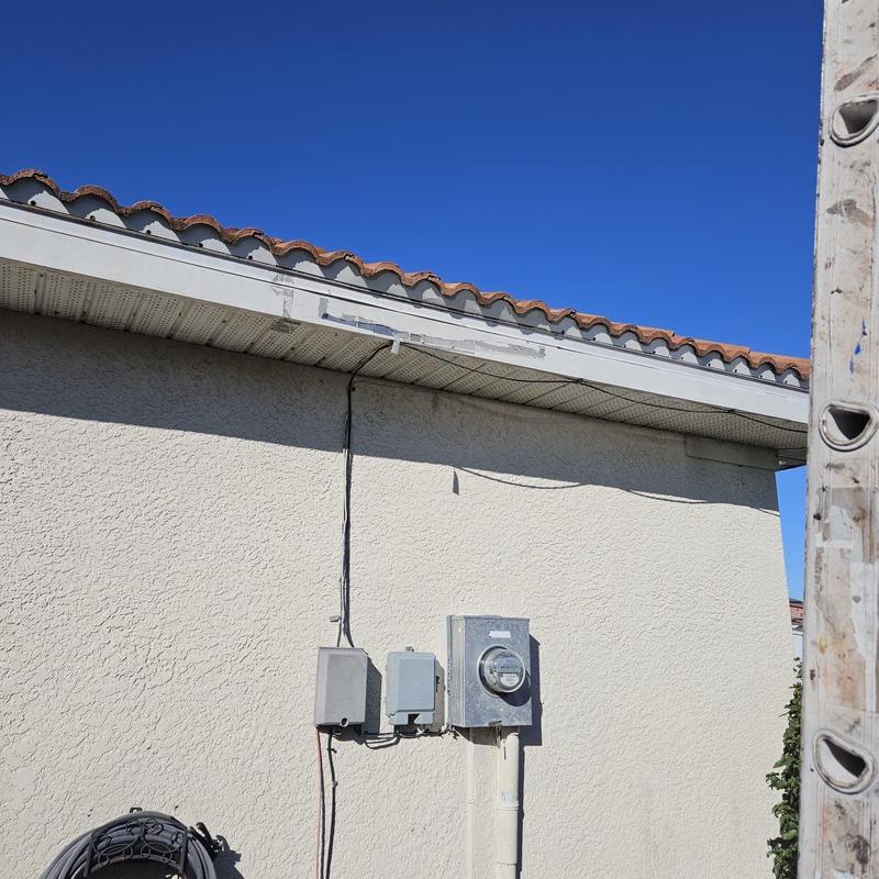 Concrete barrel tile roof with birdstop and tile repair