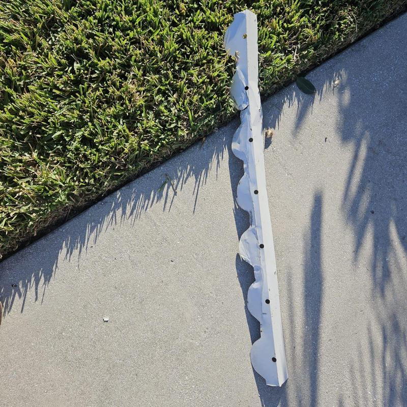 Concrete barrel tile roof birdstop removed on concrete driveway