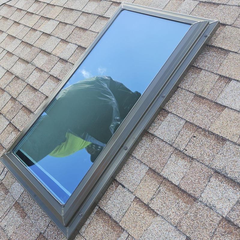 Impact-resistant LowE Kennedy skylight on shingle roof