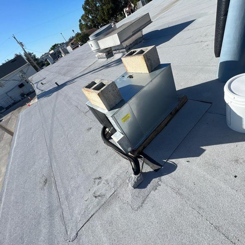 Polyglass modified bitumen flat roof with HVAC unit
