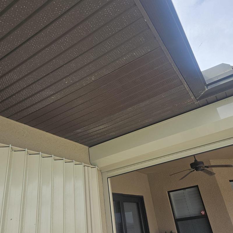Perforated soffit panels in covered patio area