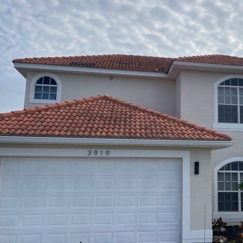 Concrete tile roof with visible wear on Cape Coral home