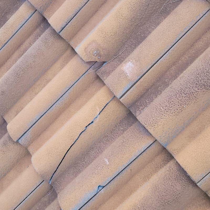 Concrete tile roof with visible crack in Cape Coral