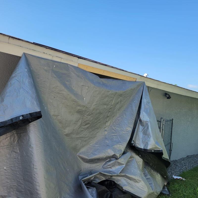 Roof valley and ridge leak repair with tarp cover