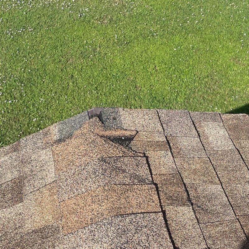 Shingle roof corner patch on older roof in Cape Coral