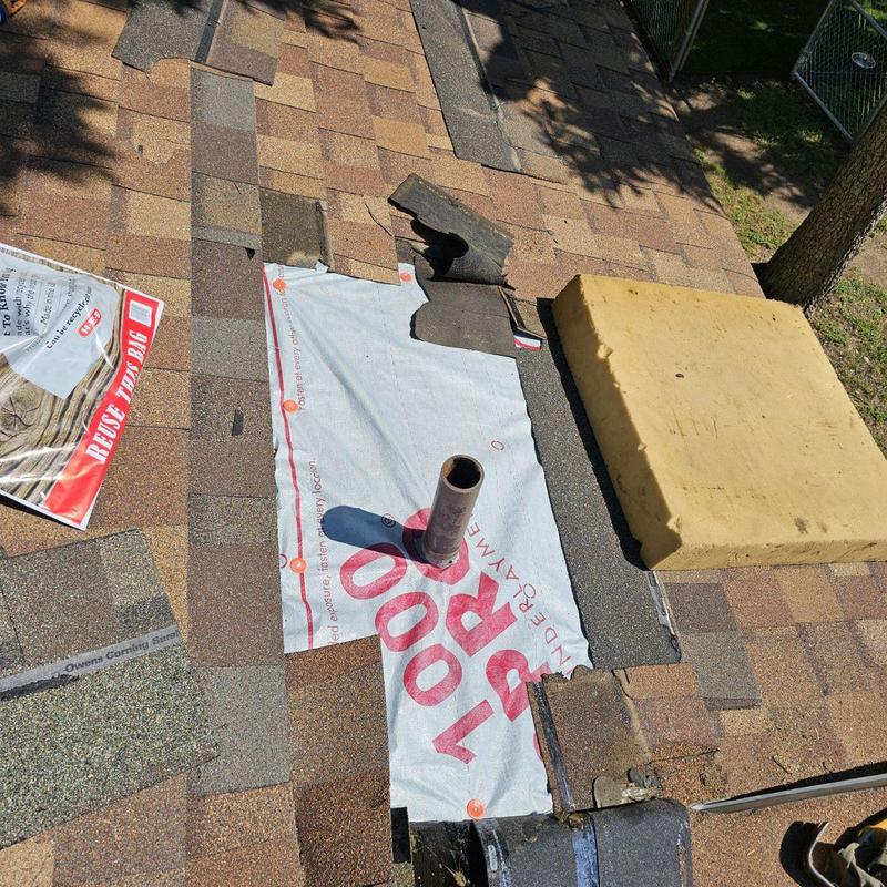 Roof shingles replacement with underlayment near vent pipe