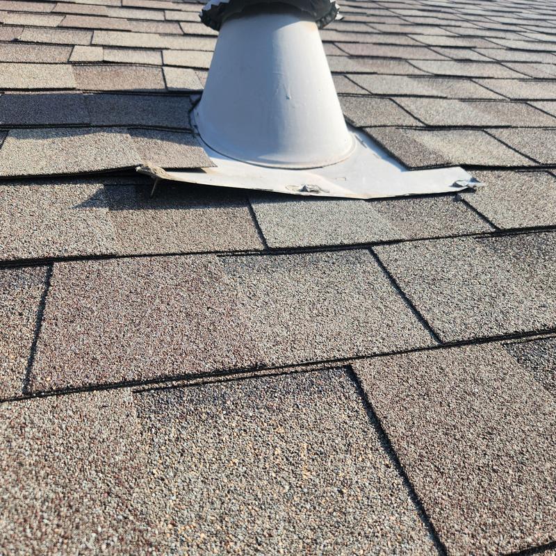 Roof vent flashing with sealed exposed fasteners