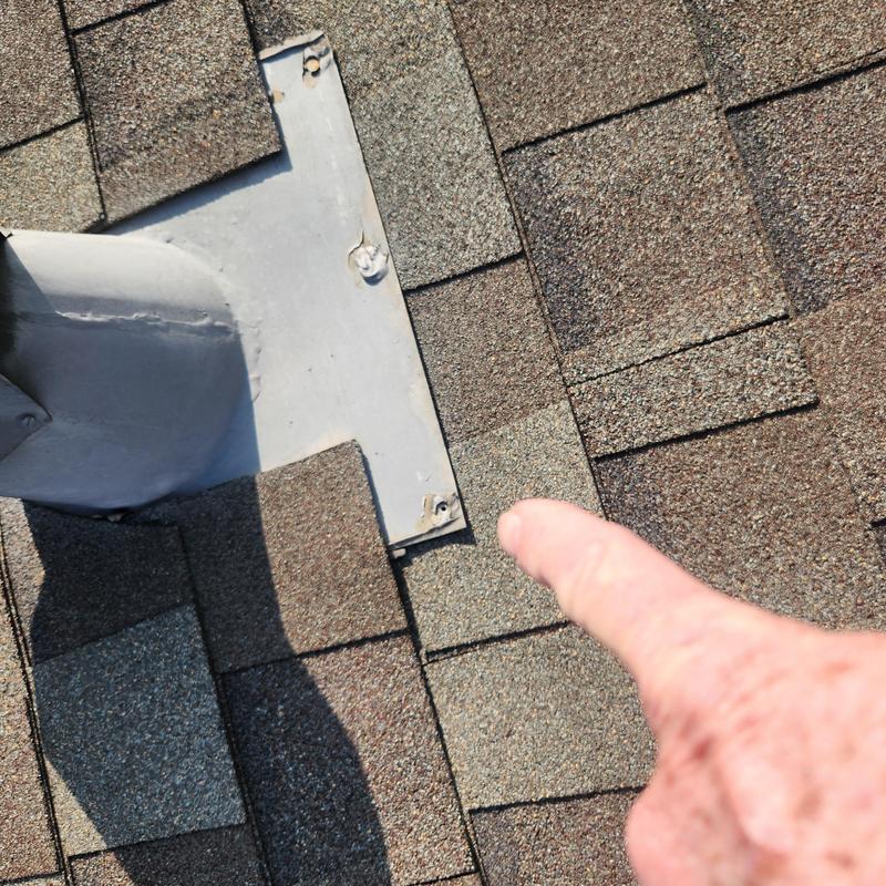 Roof vent flashing with sealed exposed fasteners