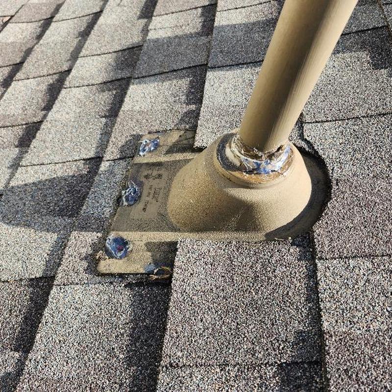 Roof pipe flashing with sealed fasteners on shingles
