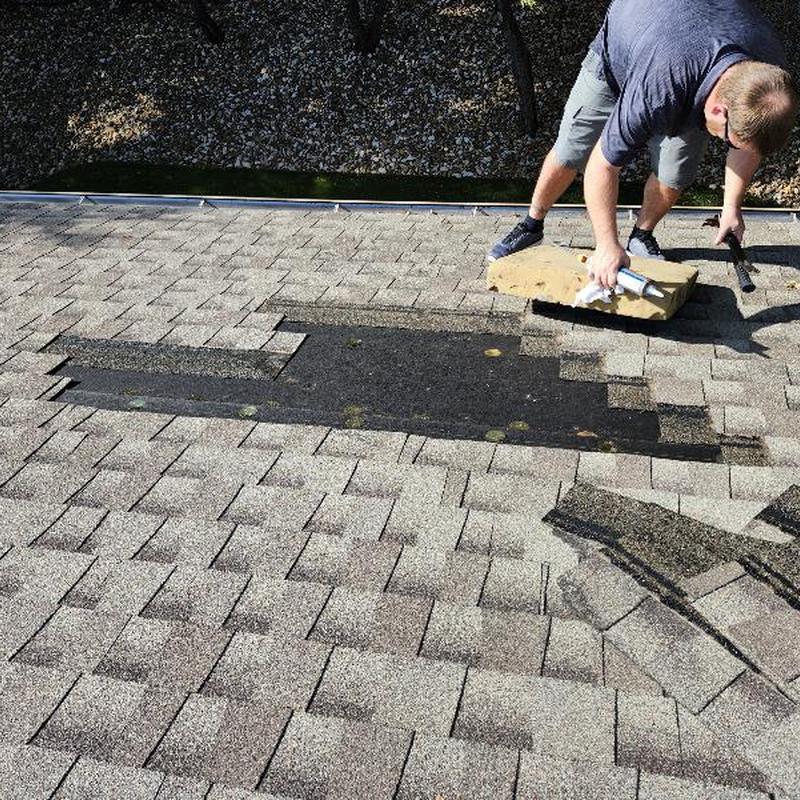 Weatherwood shingles replacement on roof with caulking