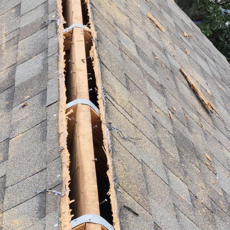 Ridge vent system installation on residential roof