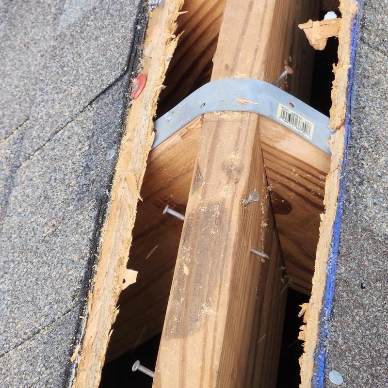 Ridge vent roof decking cutout with metal bracing