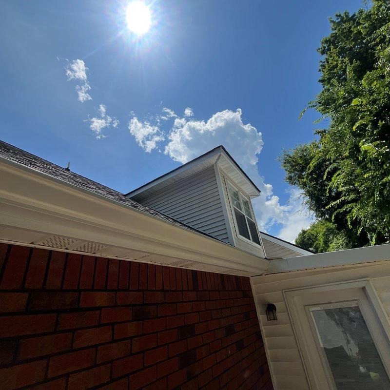 Dormer roof ridge and flashing inspection under sun