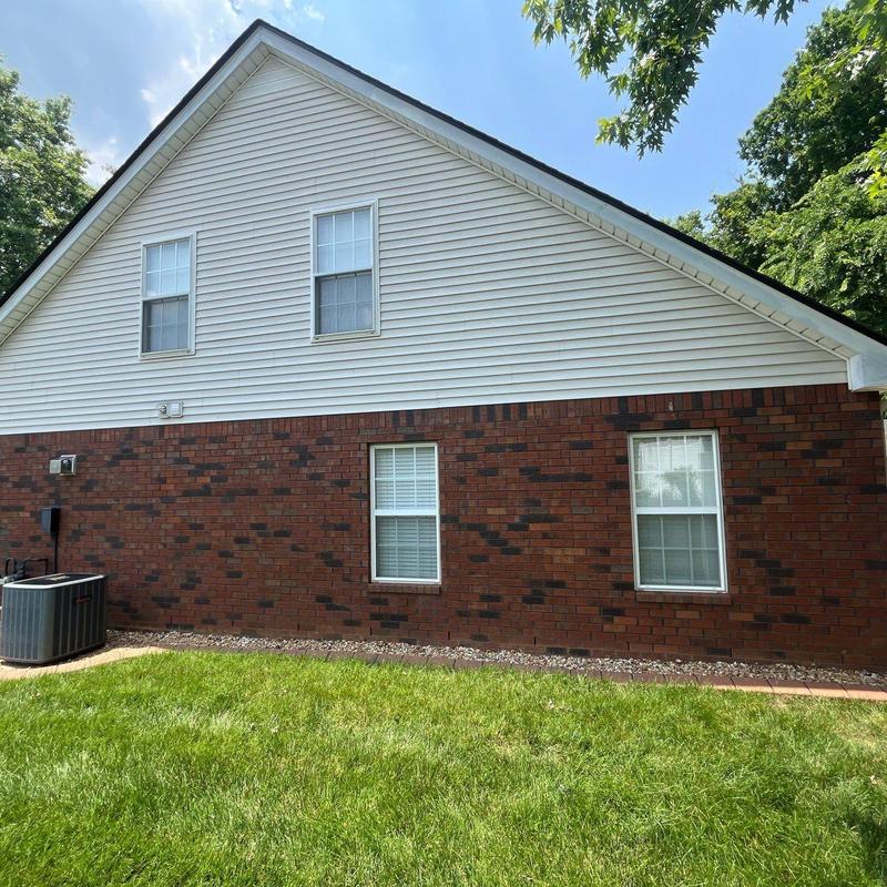 Vinyl siding inspection on residential home exterior