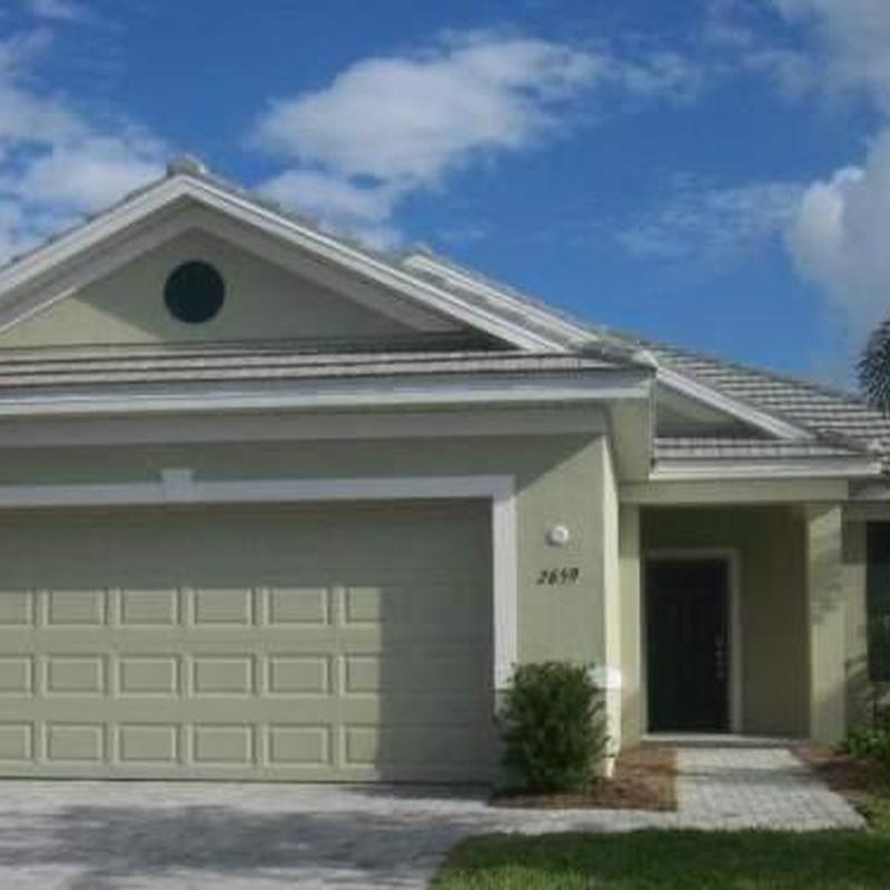 Concrete tile roof with visible damage and underlayment issues
