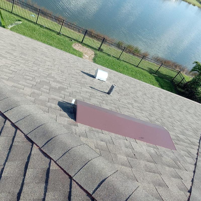 GAF Timberline shingle roof with vent pipe and cap