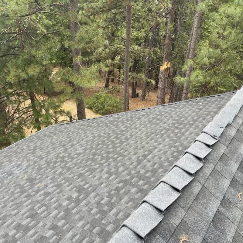 GAF lifetime asphalt roof installation on house roof