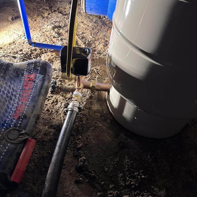 20-gallon well pressure tank with new fittings installation