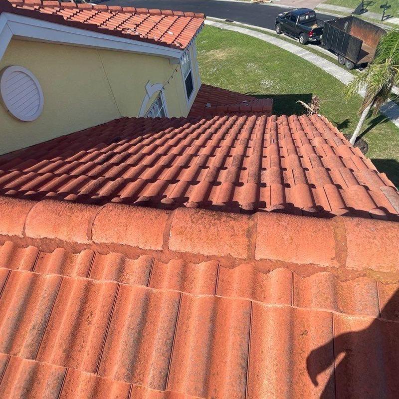 Concrete tile roof with minor tile and underlayment wear