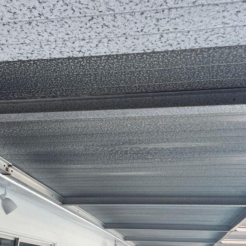 Metal patio cover panels with corrosion and wear