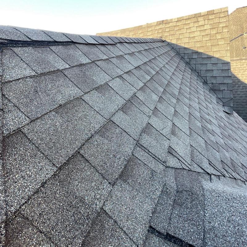 Asphalt shingle roofing with ridge vent inspection