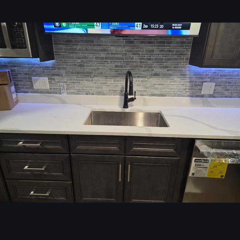 Kitchen faucet and sink installation with backsplash