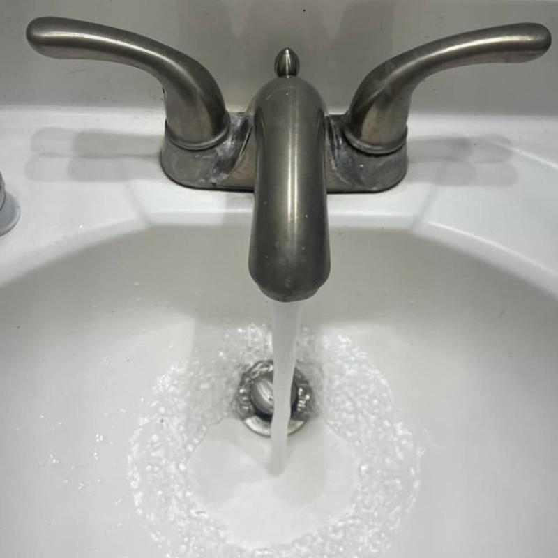 Vanity sink faucet and drain flow restoration