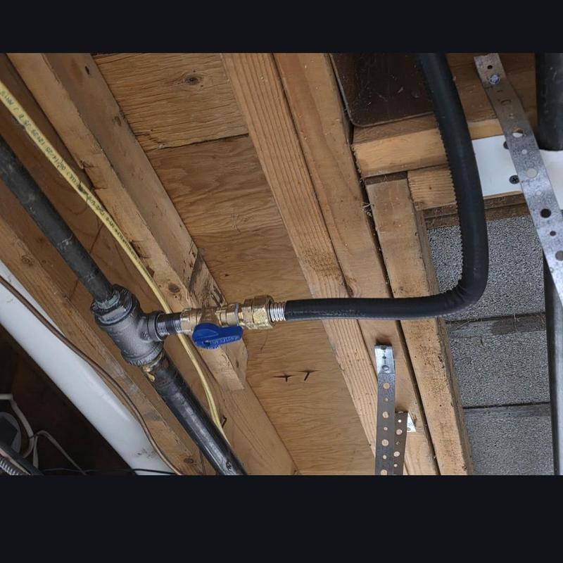 Gas line with shutoff valve and connectors under floor joists