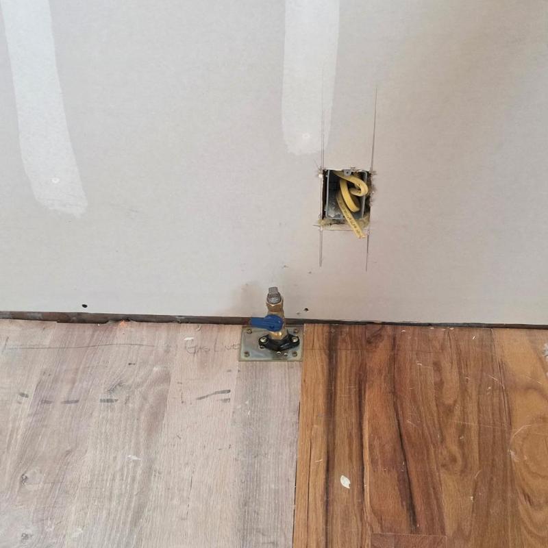 1-inch gas line valve installation near stove area