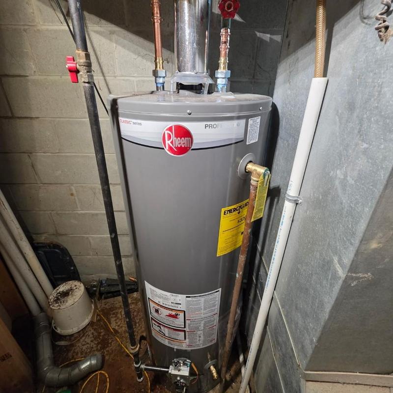 Water heater with repiped flu venting installation