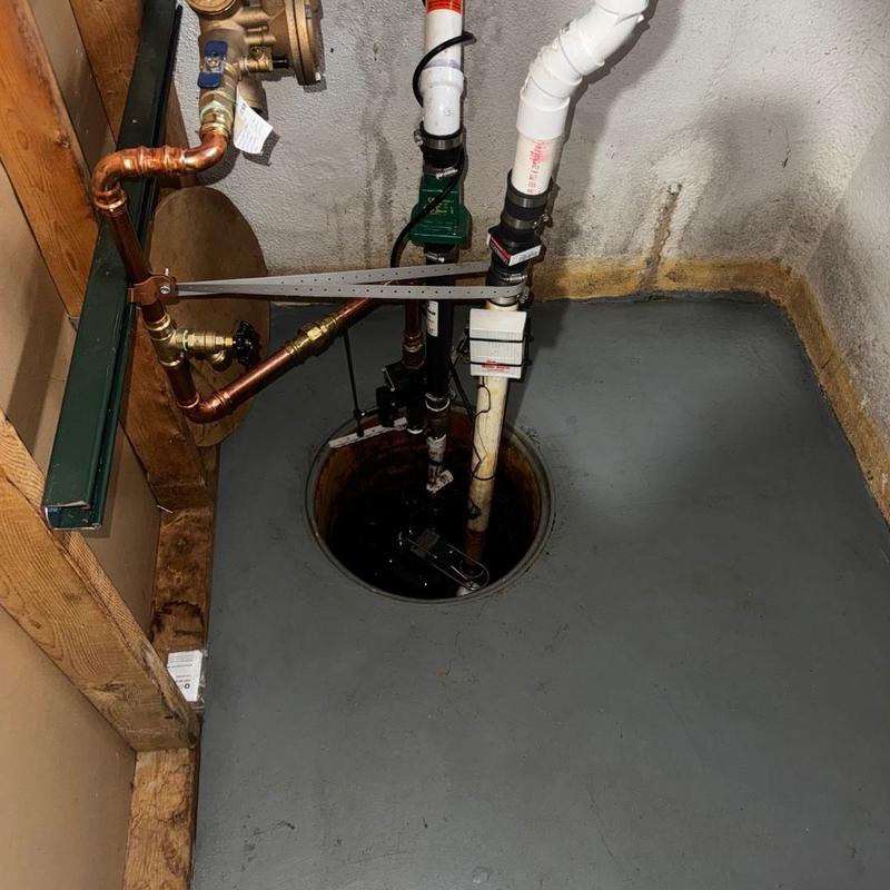 Sump pump system with new PVC and copper piping