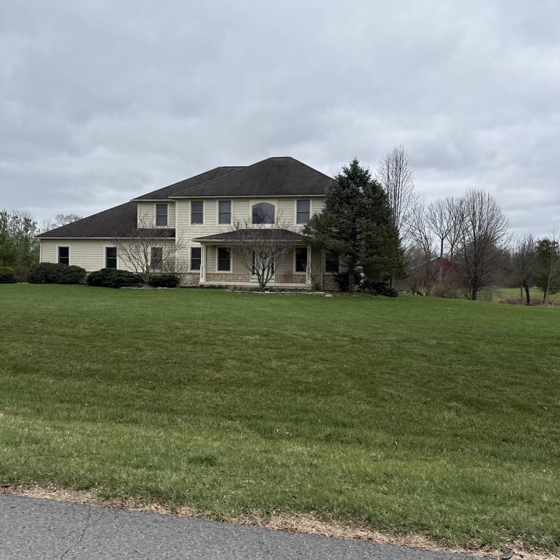 Asphalt shingle roof with storm inspection on house Asphalt shingle roof with storm inspection on house
