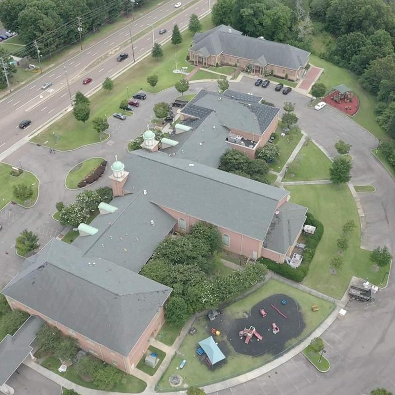 Asphalt shingle roof on large commercial building