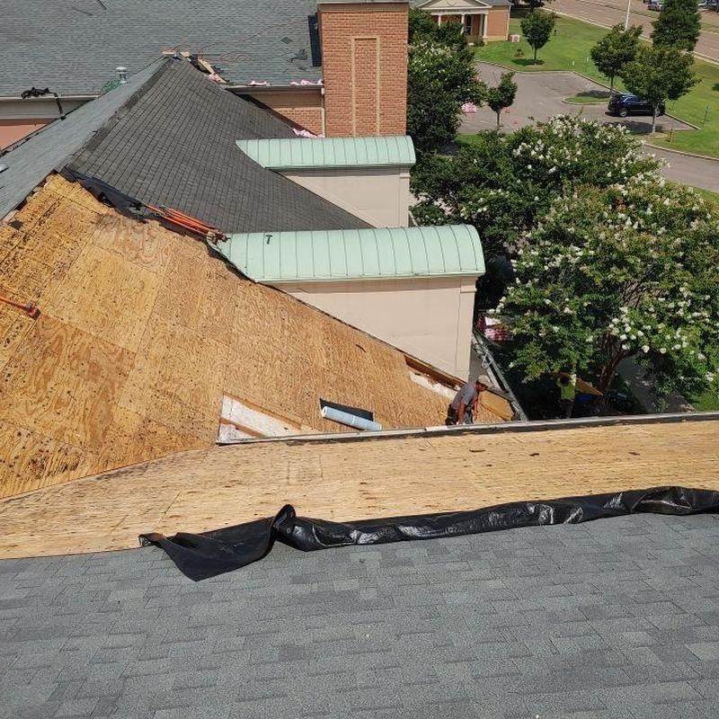 Asphalt shingle roof replacement with plywood sheathing